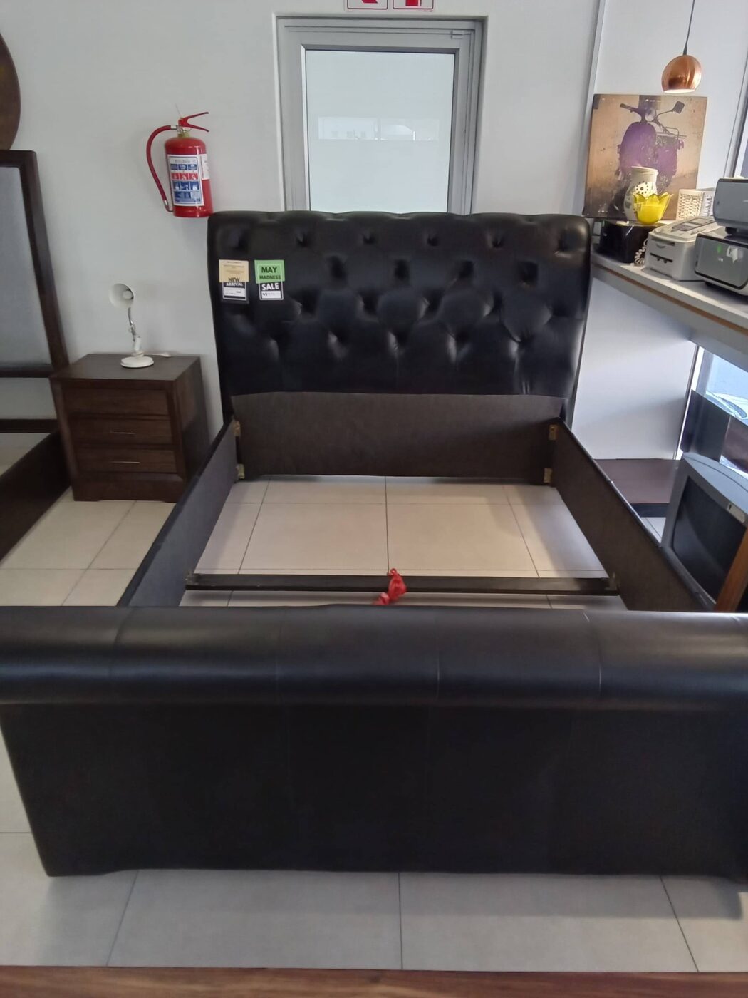 Black tufted leather sleigh bed frame, queen size