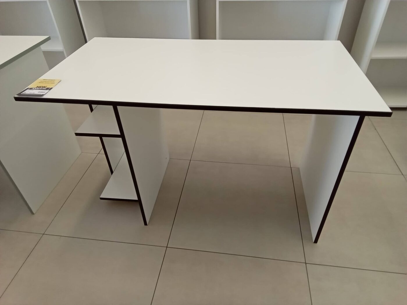 Retro 1980s style office desk in white finish with chrome trim and a single drawer